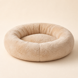 Cudli Calming Donut Pet Bed in cream, studio product photograph